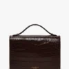 Bolso Dorian en piel marrón oscuro con relieve Bolso Dorian en piel marrón oscuro con relieve
