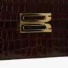 Bolso Dorian en piel marrón oscuro con relieve Bolso Dorian en piel marrón oscuro con relieve