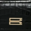 Bolso Dorian pequeño en piel negra repujada