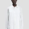 Camisa con pliegues en blanco Camisa con pliegues en blanco