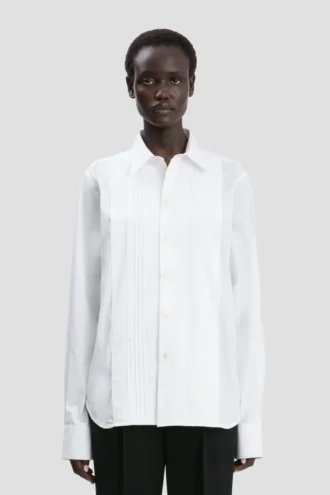 Camisa con pliegues en blanco