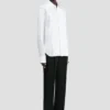 Camisa con pliegues en blanco Camisa con pliegues en blanco