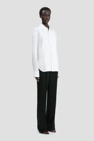 Camisa con pliegues en blanco