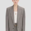 Chaqueta con mangas esculturales en níquel Chaqueta con mangas esculturales en níquel