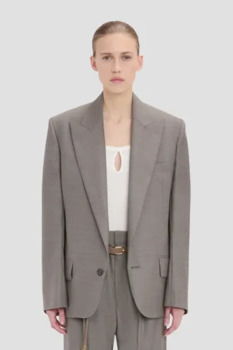Chaqueta con mangas esculturales en níquel