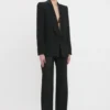 Chaqueta de esmoquin con cuello chal en negro Chaqueta de esmoquin con cuello chal en negro