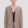 Chaqueta sin cuello en color piedra caliza Chaqueta sin cuello en color piedra caliza