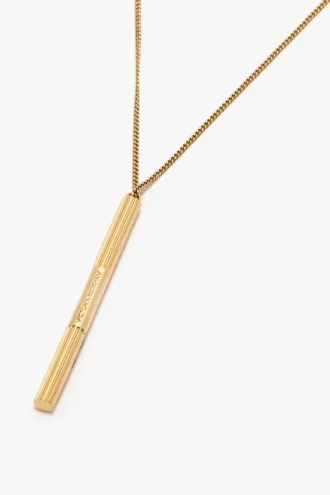 Collar con colgante de gemelos en oro claro