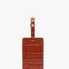 Etiqueta para equipaje en piel con relieve de cocodrilo en rojo ladrillo Etiqueta para equipaje en piel con relieve de cocodrilo en rojo ladrillo