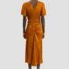 Falda midi Bela en color bronce Falda midi Bela en color bronce