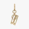 Llavero con charm en dorado Llavero con charm en dorado