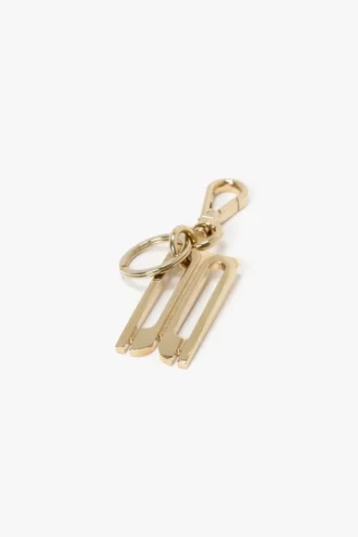 Llavero con charm en dorado
