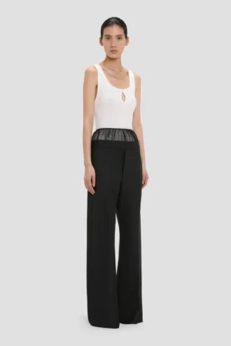 Pantalón con paneles transparentes en negro