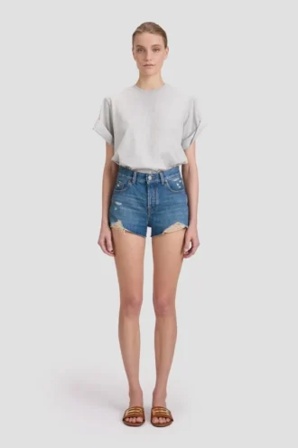 Pantalones cortos desgastados en lavado azul medio