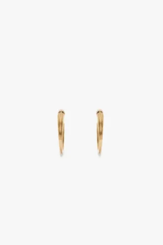 Pendientes tipo gemelos en oro claro