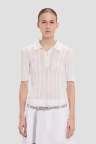 Polo con volantes en blanco