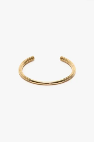 Pulsera tipo gemelos en oro claro