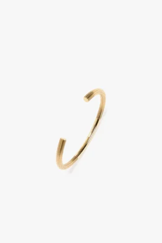 Pulsera tipo gemelos en oro claro