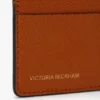 Tarjetero The Victoria en piel granulada naranja quemado Tarjetero The Victoria en piel granulada naranja quemado