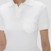 Top con cuello polo en blanco Top con cuello polo en blanco