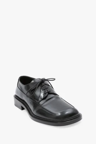 Zapatos planos con cordones de piel negra